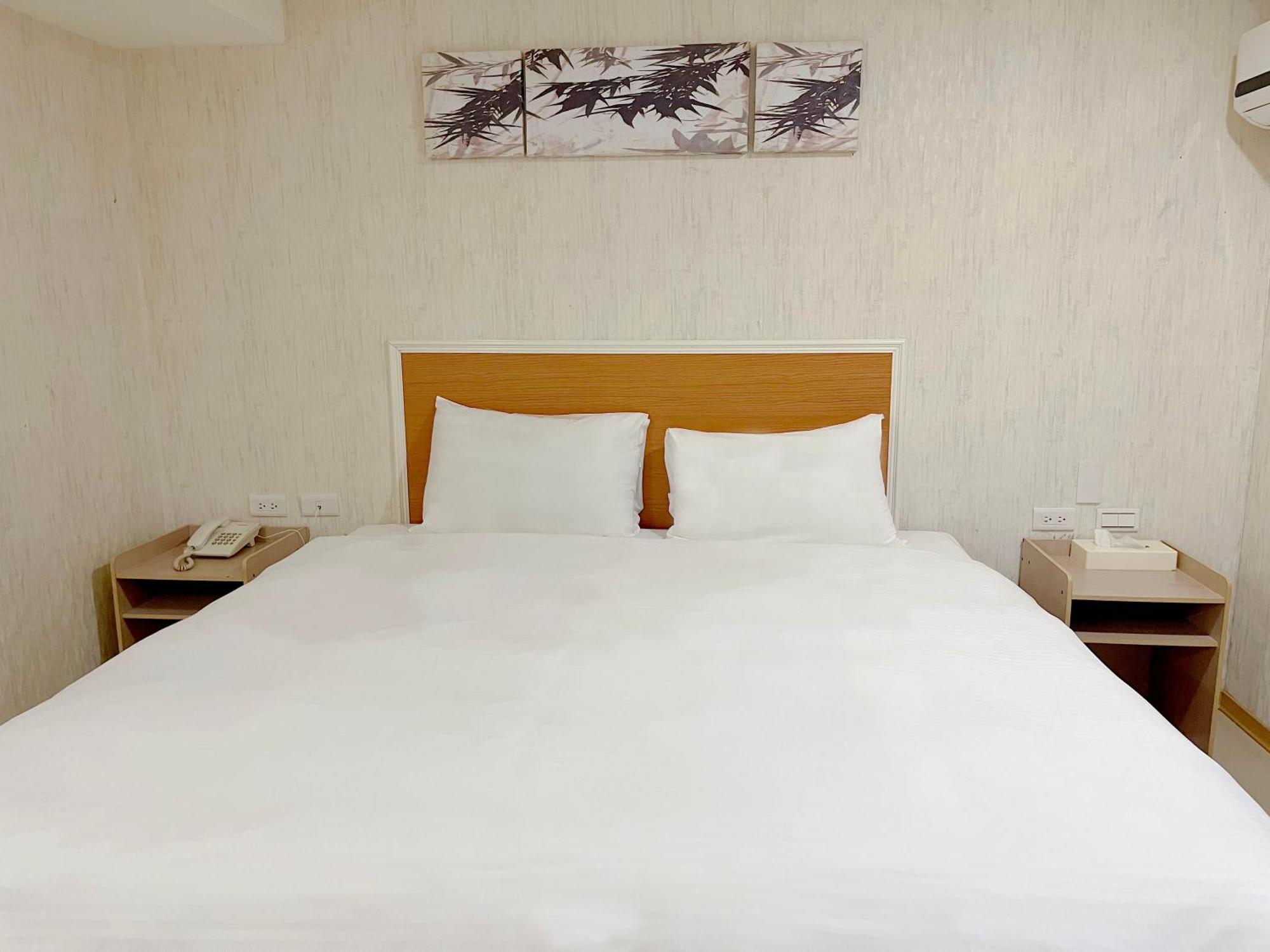 E Lim Hotel Zhongli Værelse billede