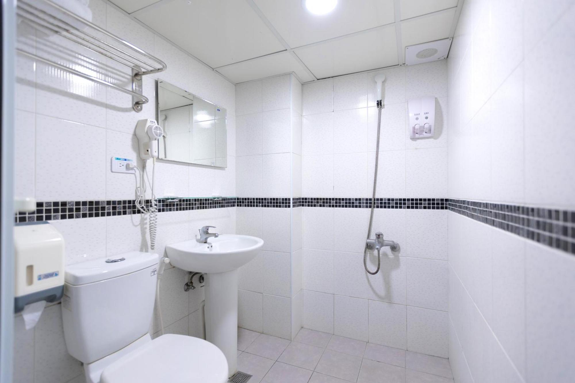 E Lim Hotel Zhongli Værelse billede
