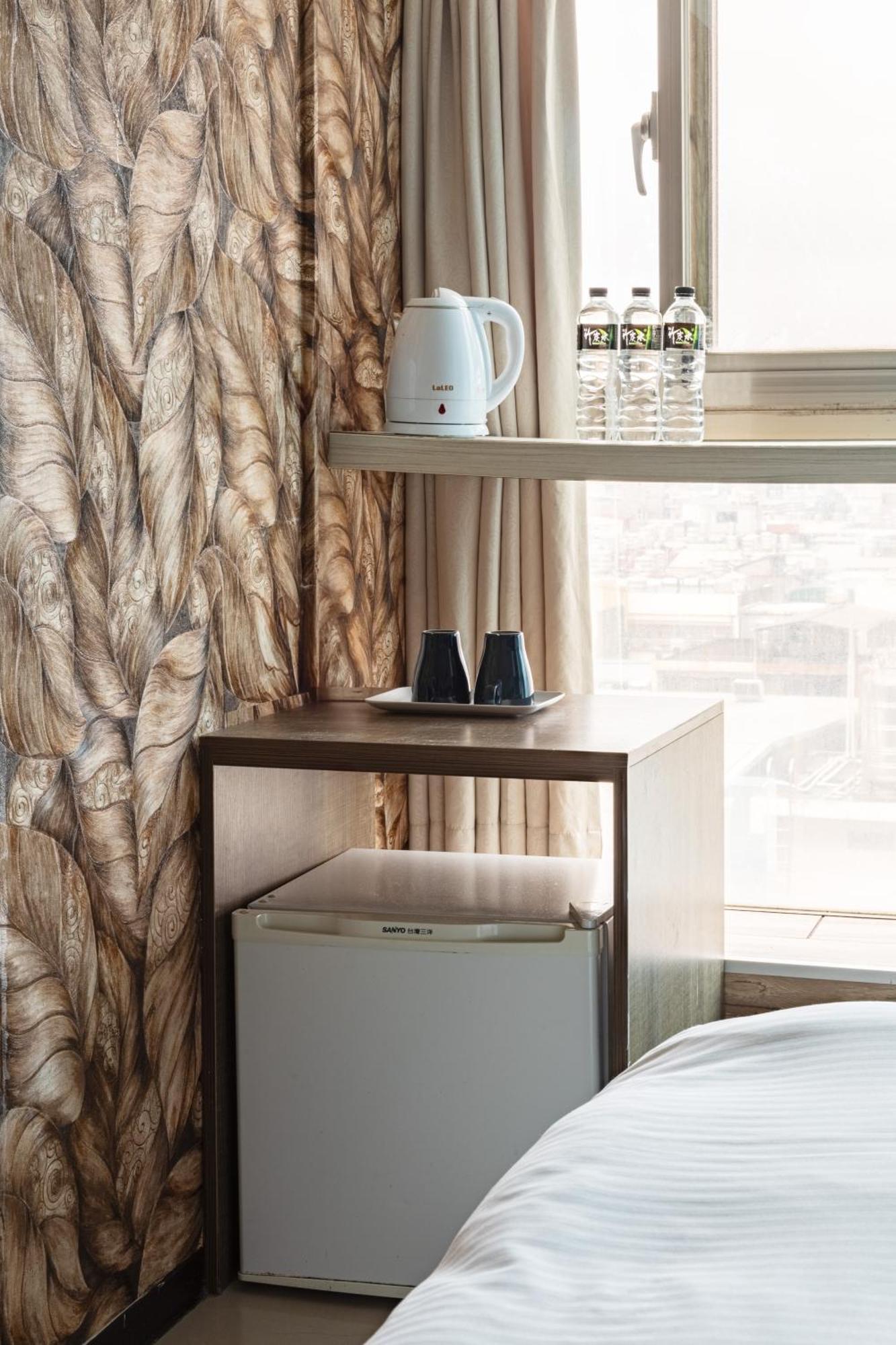 E Lim Hotel Zhongli Værelse billede