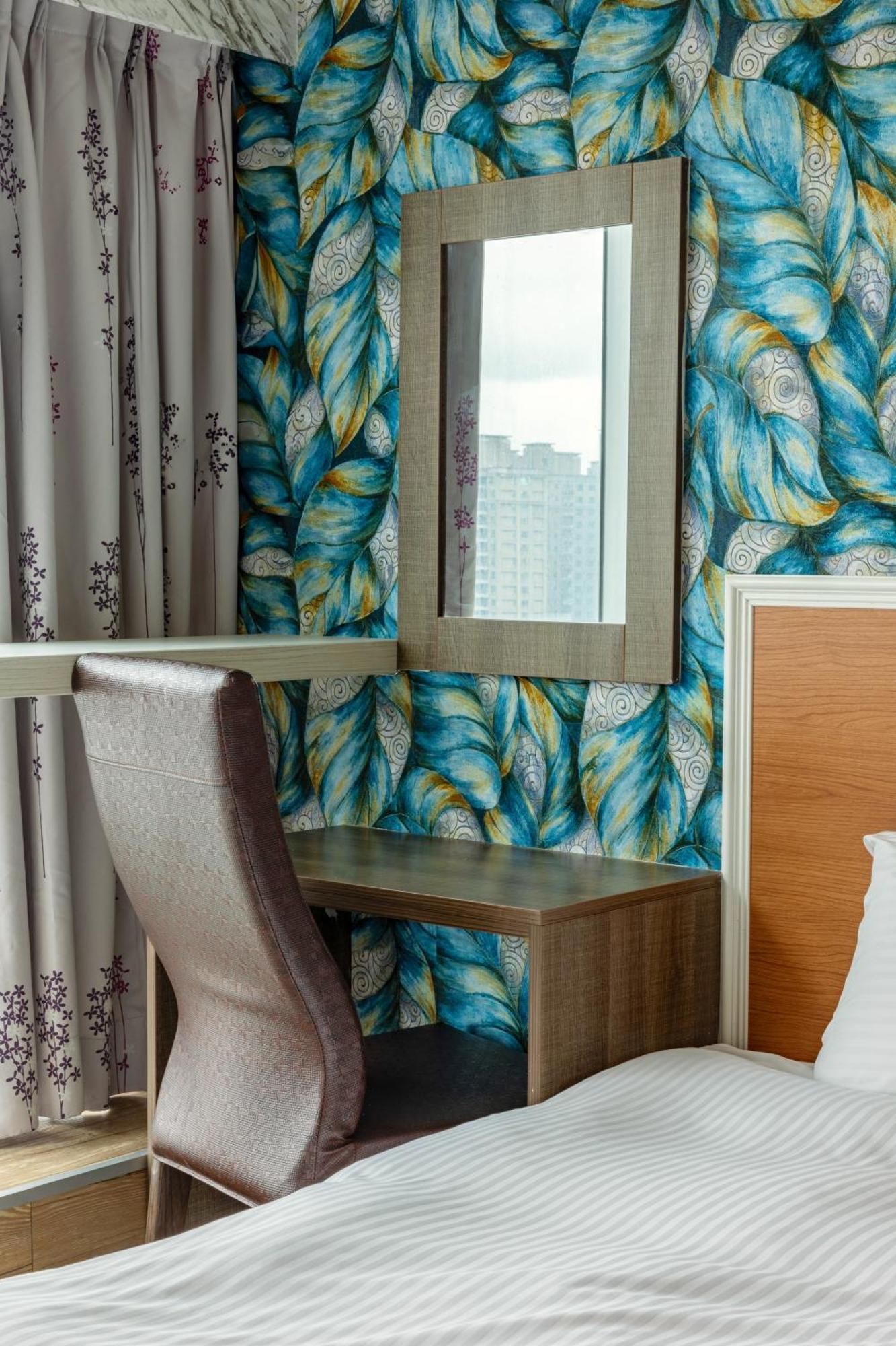 E Lim Hotel Zhongli Værelse billede